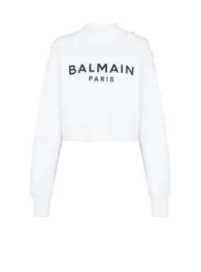 BALMAIN  Sweat court boutonné à logo imprimé - Blanc