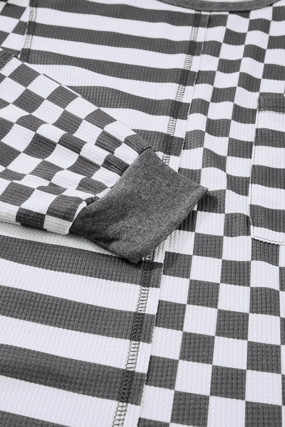 Chemisier gris foncé à poches et manches lanternes *